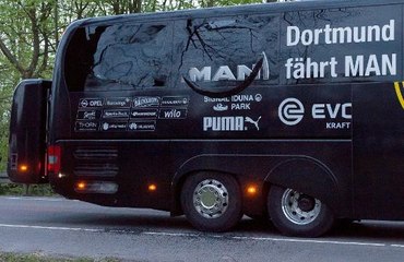 Borussia Dortmund player injured after explosions near team bus