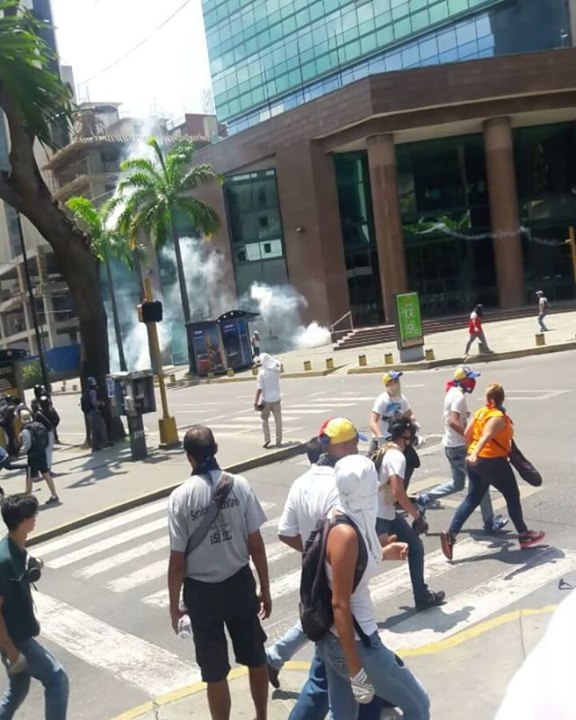 Demonstrators Flee From Tear Gas As Caracas Protests Mount