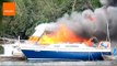 Firefighters Rescue People in Boat Fire
