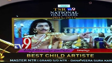 Master NTR taking award from balayya and catching his feet-ntr-balakrishna