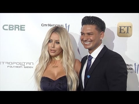 Aubrey O'Day & DJ Pauly D La Vie En BLUE Fashion Gala Blue Carpet