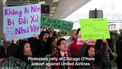 People rally at Chicago O'Hare to protest United Airlines