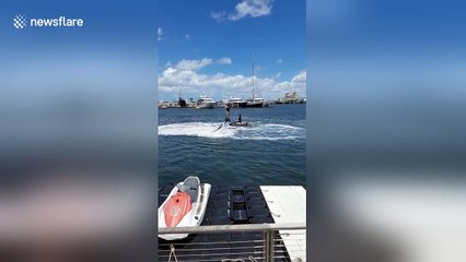 Girl face plants into the sea during flyboard fail