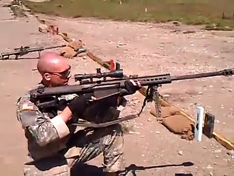 50 cal Barrett sniper rifle fired while kneeling