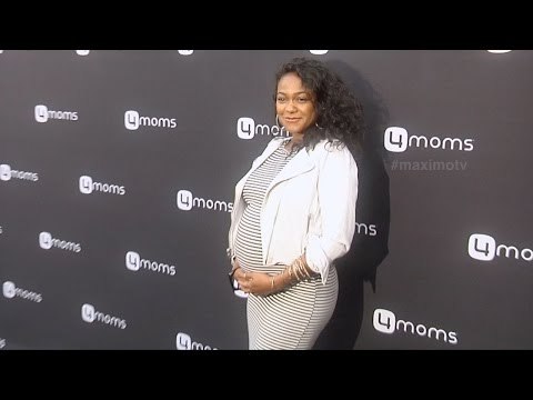 Tatyana Ali 4moms Self-Installing Car Seat Launch Black Carpet