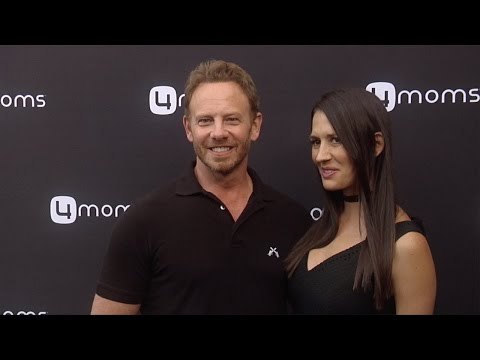 Ian Ziering & Erin Kristine Ludwig 4moms Self-Installing Car Seat Launch Black Carpet