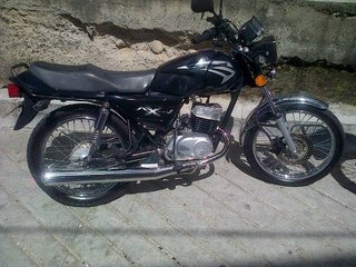 Suzuki AX 100 Desmontar Rueda Delantera De Moto ToroMotos