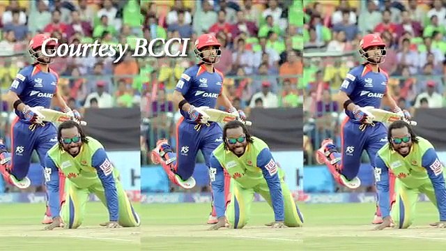 CHRIS GAYLE PRETENDS TO HIT YUVRAJ SINGH WITH BAT