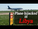 Libya : Passenger plane with 118 people onboard hijacked, force landed in Malta | Oneindia News