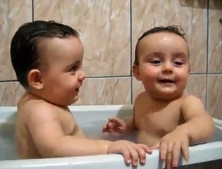 Twins Brothers Enjoying Bath Time