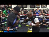 Watch Floyd Mayweather get hands wrapped & hit body shield as he prepares for Manny Pacquiao