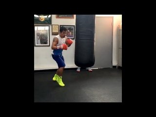 Watch Manny Pacquiao kill the heavy bag with 10 punch combos ahead of Mayweather fight