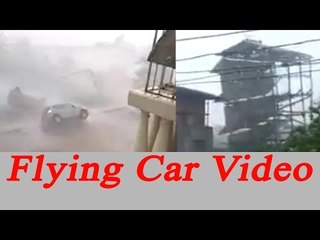 Vardah Cyclone: Car fly away, building collapsed; Watch video | Oneindia News