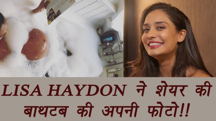 Lisa Haydon flaunts her baby bump in a bathtub | FilmiBeat