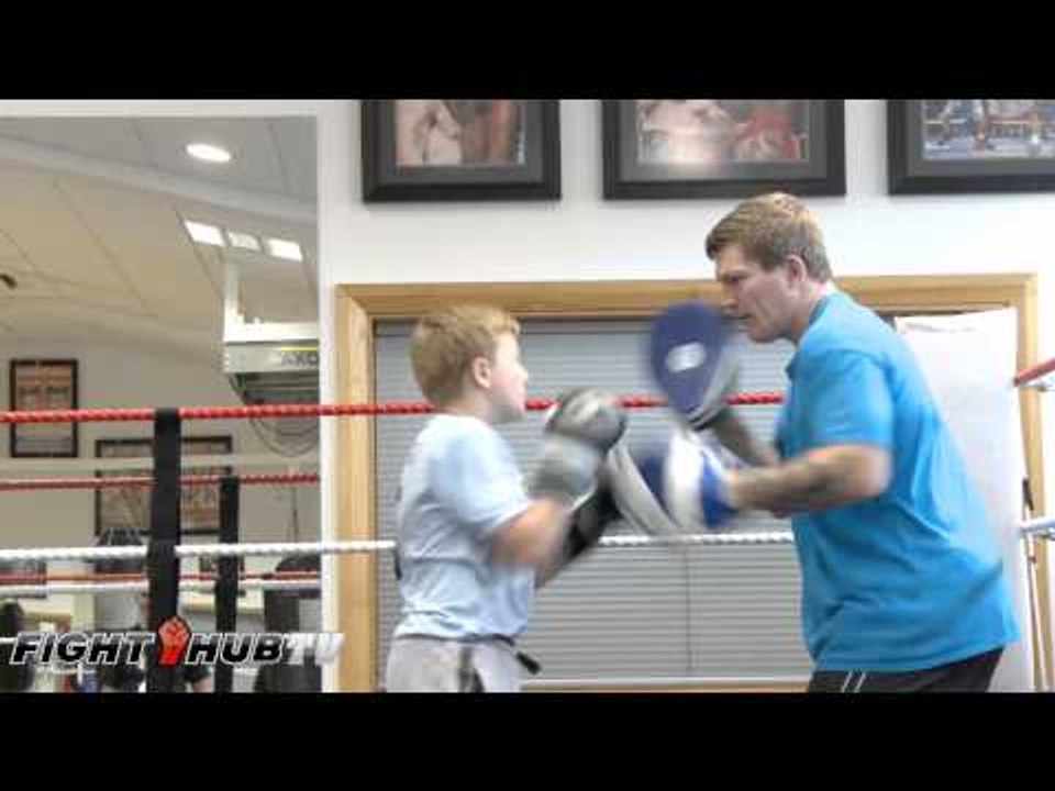Ricky Hatton's son, shows off body punch combinations as he works the mitts with dad