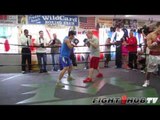 Zou Shiming works mitts with Freddie Roach