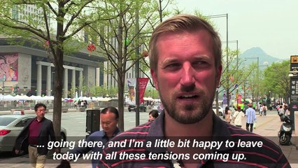 Residents and tourists in S.Korea react to N.Korean missile test