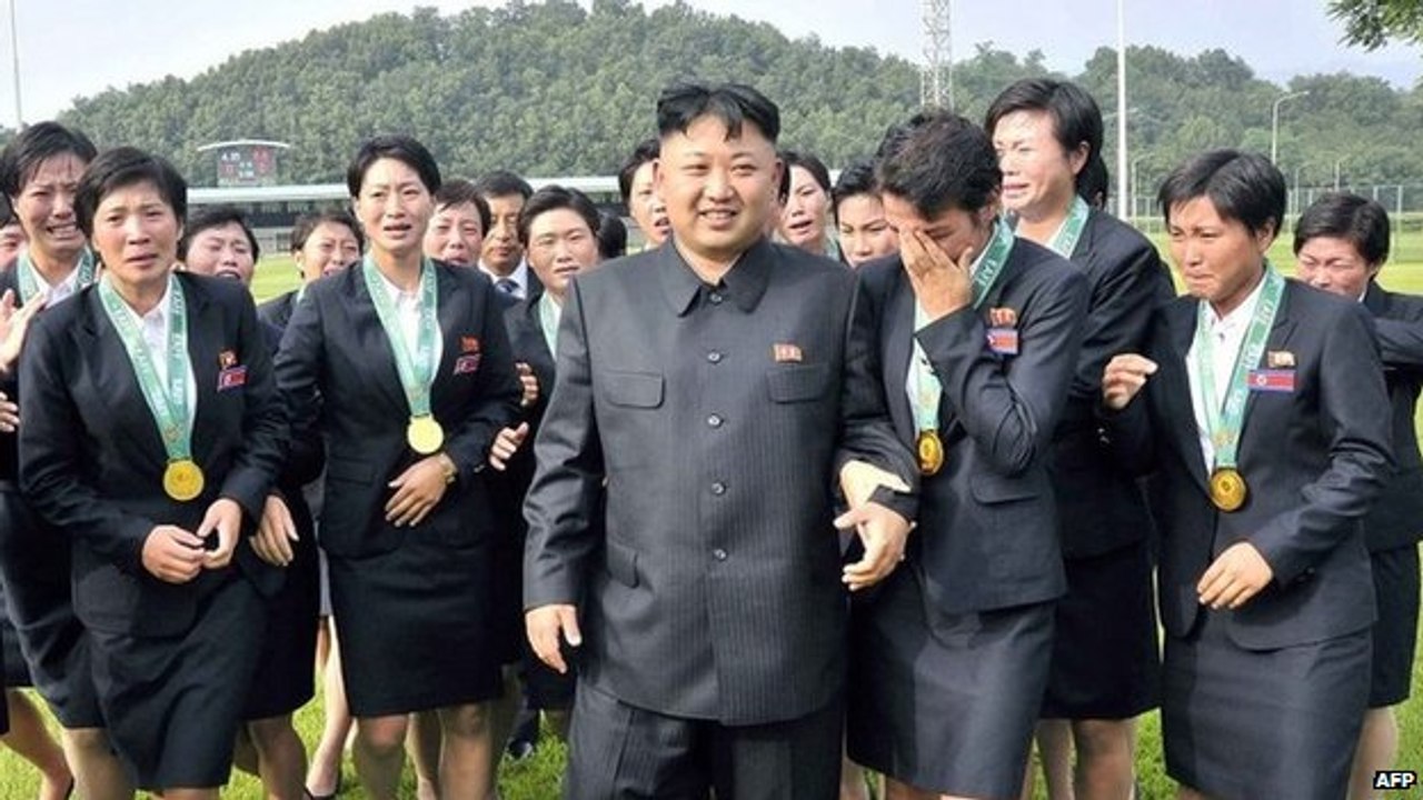 Kim Jong-un | Dictator Thousands of people stood up and clapped their hands
