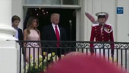 Melania Trump nudges Donald to put hand on heart -