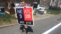 Man Motivates Boston Marathon Runners with Patriots Super Bowl 51 Scoreboard Sign