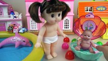 Baby doll Dolphin swim and Surprise eggs Slime Shellfish bath toys