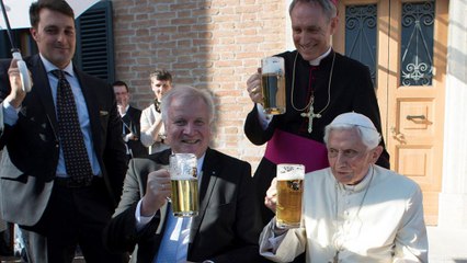 Pope Benedict XVI toasts his 90th birthday with a pint
