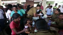 Cientos buscan en la basura a sus familiares en Sri Lanka