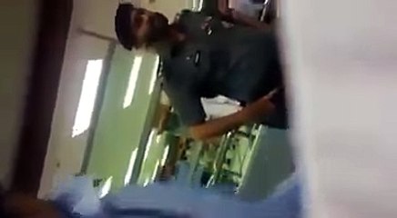 2 women are fighting with officials at Islamabad Airport.