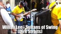Un musicien de rue fait une reprise de Sultans Of Swing des Dire Straits au Brésil
