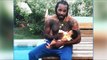 Chris Gayle feeding milk to his daughter Blush, See pic | Oneindia News