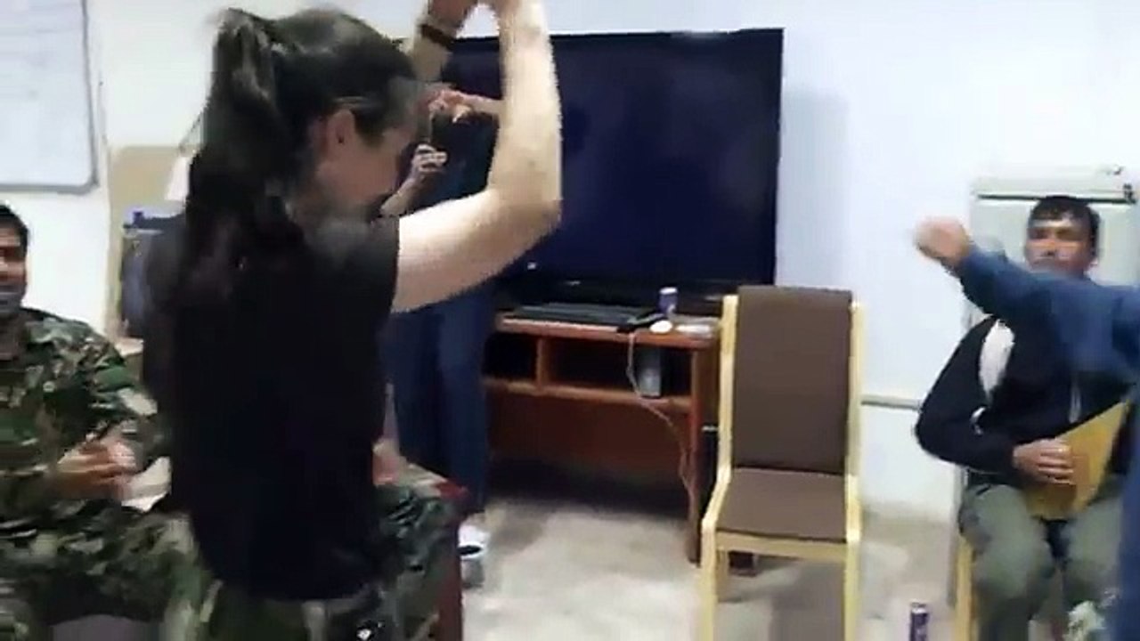 American Girl And Afghan Soldier Performing Romantic Dance