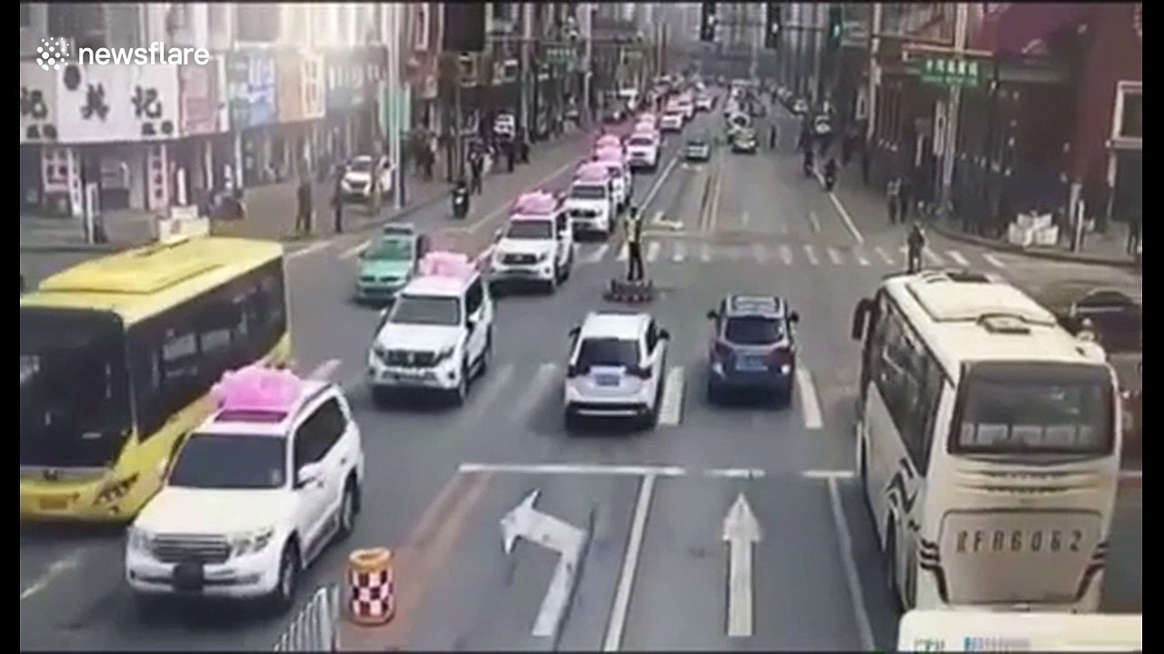 Driver presses accelerator by mistake and ploughs into police officer