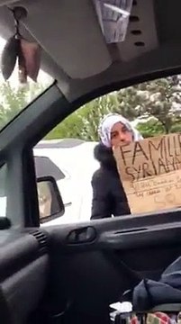 Une femme tente de se faire passer pour une Syrienne afin de récolter quelques pièces