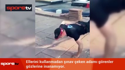 Elini kullanmadan şınav çekti!