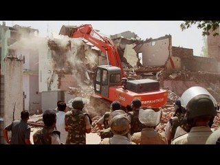 Video herunterladen: Meerut : Wall collapse during anti-encroachment drive, 4 killed | Oneindia News