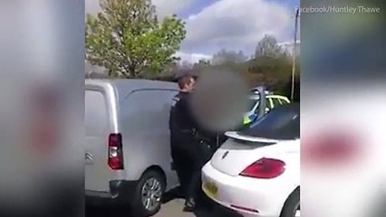 Shocking moment builder star of TV's Renovation Game is 'dragged from a car by police then beaten with a baton