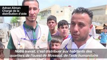 Au-milieu des ruines, des habitants à Mossoul continuent de fuir