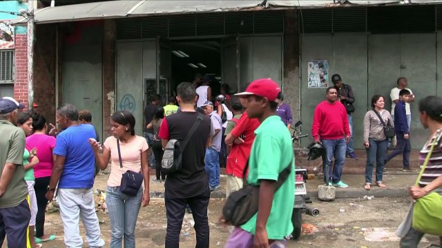 Muerte y saqueos: crónica de una batalla campal en Venezuela