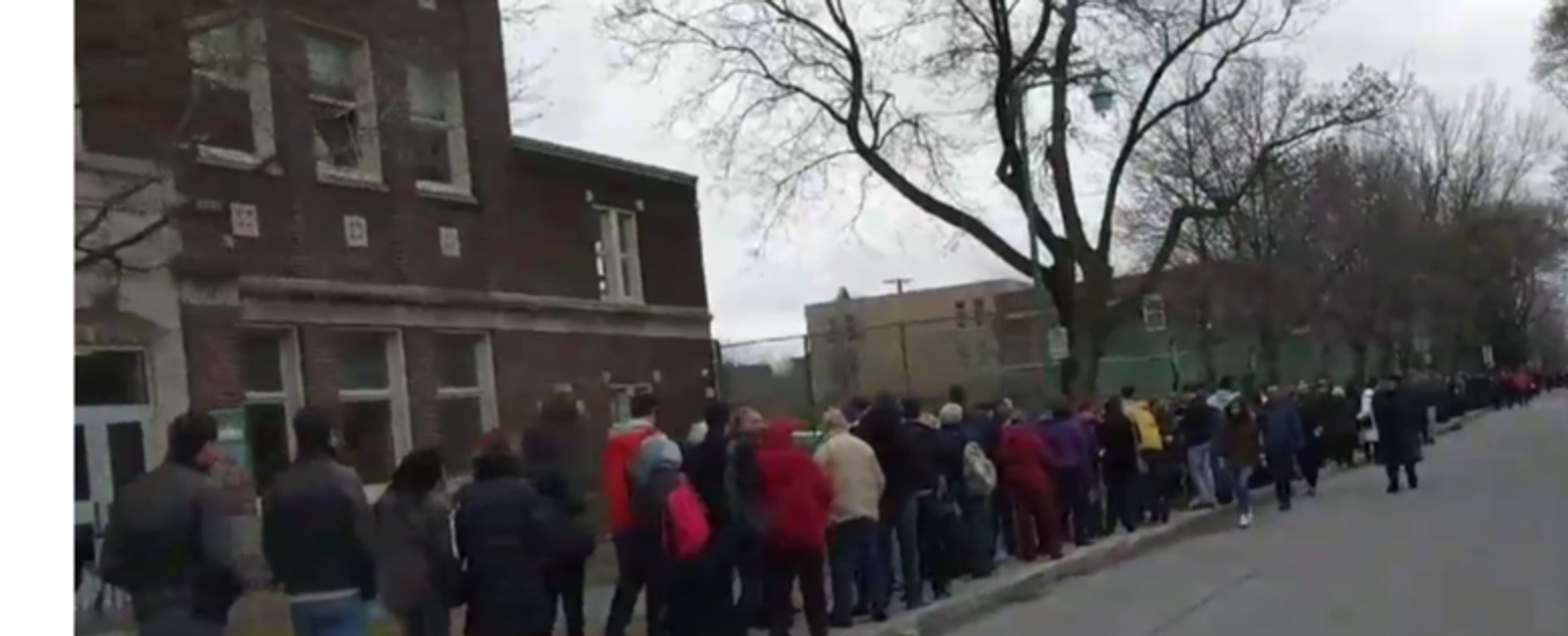 French Voters in Montreal Queue Around the Corner to Cast Ballot