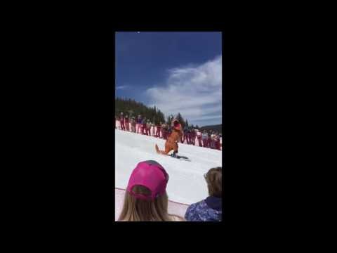 Skiing T-Rex Crash Lands During Colorado Pond Skim Event