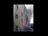 South Korean mom throwing kids from building on fire, Watch video | Oneindia News