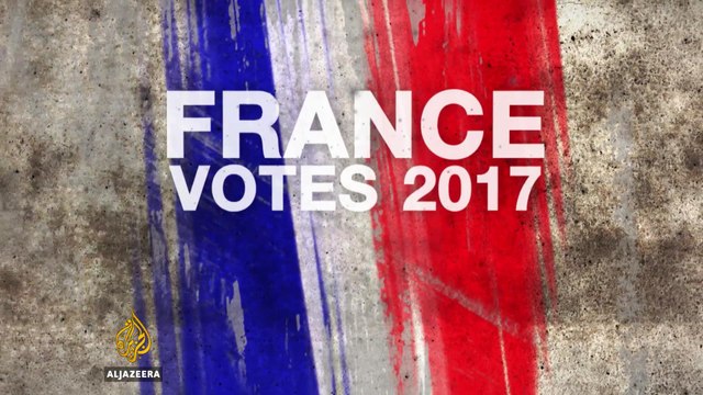 France election: Voters cast ballots in first round