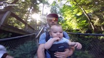 Baby has the time of his life crossing the Capilano Suspension bridge
