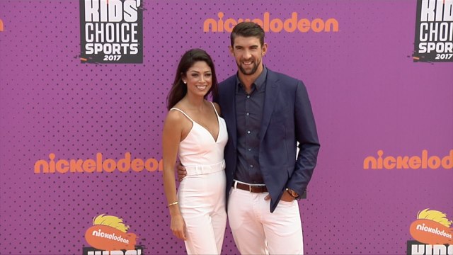 Michael Phelps and Nicole Johnson 2017 Kids’ Choice Sports Awards Orange Carpet