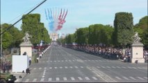 Macron seeks to charm Trump at Bastille parade in Paris