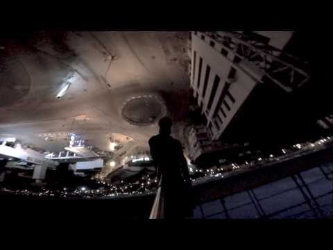 Man Fearlessly Hangs From Crane Above Moroccan Capital