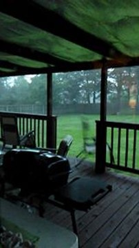 Winds Blow Chair off Arkansas Porch During Tornado-Warned Storm