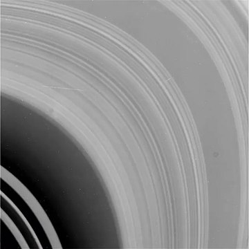 close-up view of Saturn's rings shows that many tiny rings make up the larger rings around the planet.