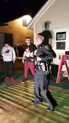 Police officer answering noise complaint ends up teaching kids how to dance salsa