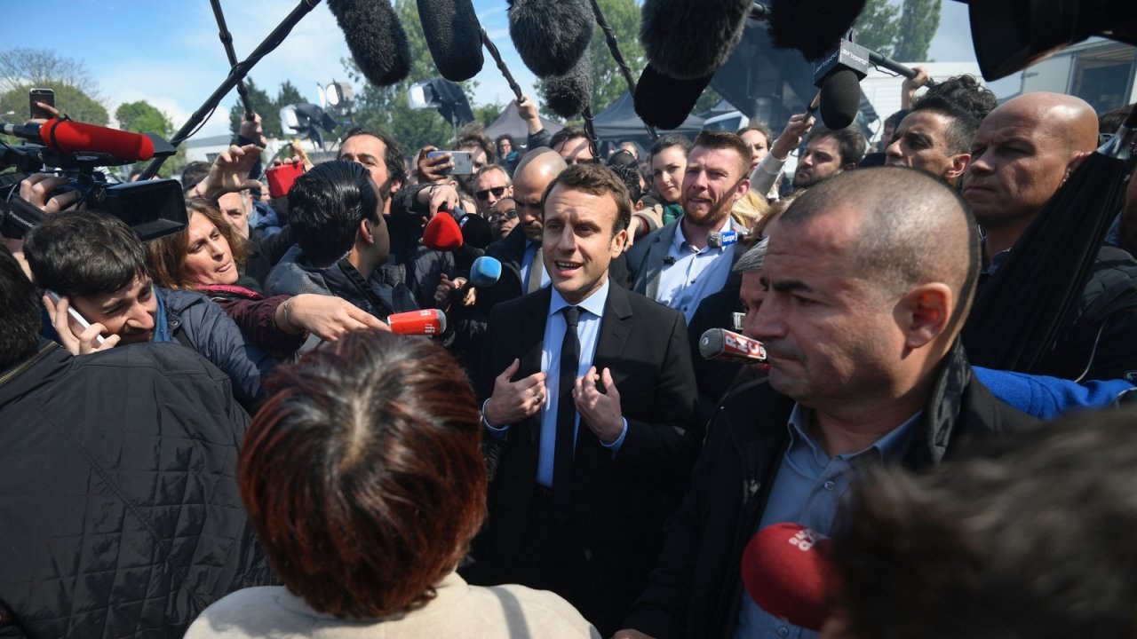 Emmanuel Macron booed by crowd and upstaged by Marine Le Pen over Whirlpool factory closure